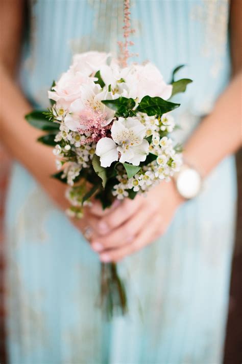 How many flowers are in a bridesmaid's bouquet? Small Blush Bridesmaids Bouquet