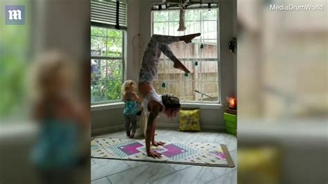 Mother Does Yoga Moves Whilst Breastfeeding Her Two Year Old Daily Mail Youtube