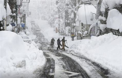 Heavy Snowfall In Japan Leaves 1000 Drivers Stranded In Traffic Jam