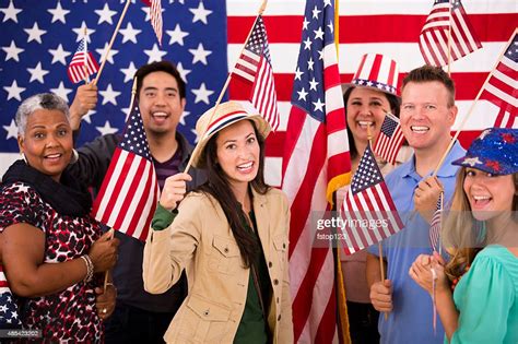 Multiethnic Group American People At Political Rally Usa Flags Voting High Res Stock Photo