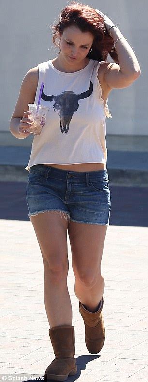 Britney Spears Shows Off Her Toned Legs And Midriff As She Shops In Tiny Denim Cut Offs And Tank
