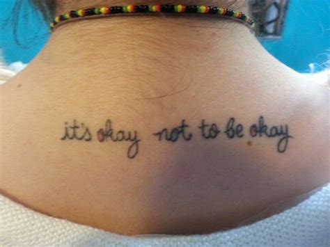 its okay not to be okay tattoo on my back i hate that i can t look at it but knowing that i