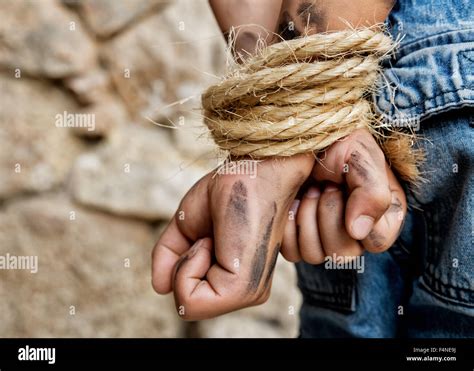 Hands Tied Behind Back Rope Hi Res Stock Photography And Images Alamy