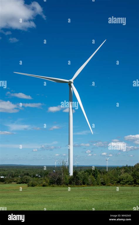 Wind Turbines At A Wind Farm With Blue Sky Stock Photo Alamy