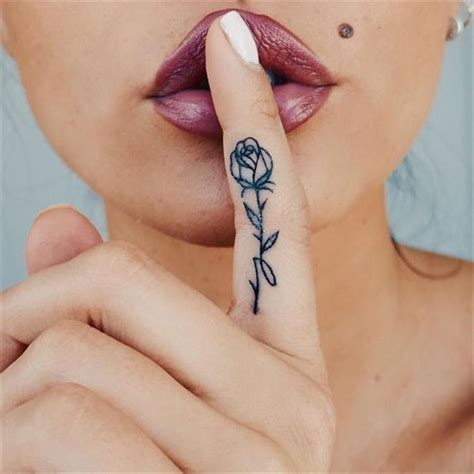 Pin By 🩵 On Tattoo Ideas Finger Tattoo For Women Tattoos For Women Flowers Hand And Finger