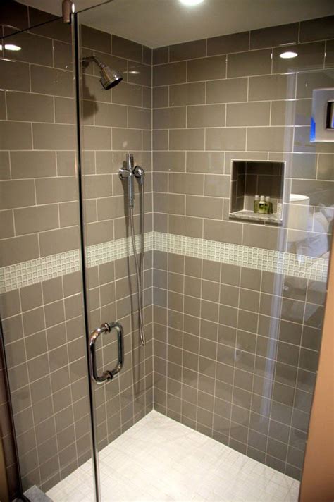 The shower area tiled with elegant gray tile looks really stylish and respectable. 40 gray shower tile ideas and pictures 2020