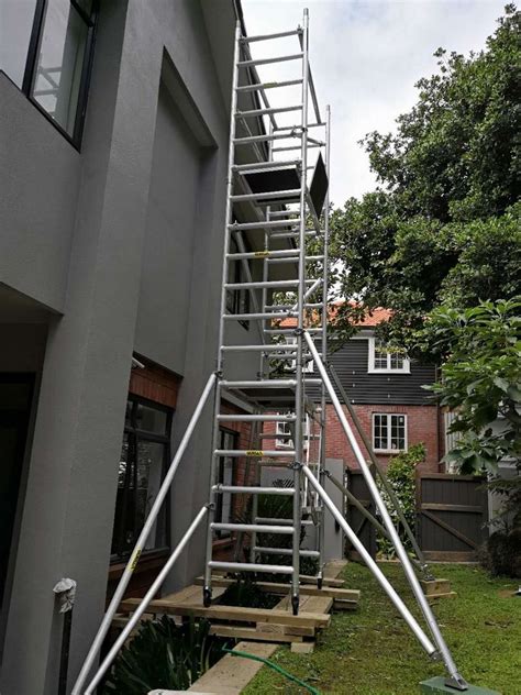 Painting takes longer when heights exceed 8' above the floor. Epsom House Washing and Exterior Paiting | House Painters ...