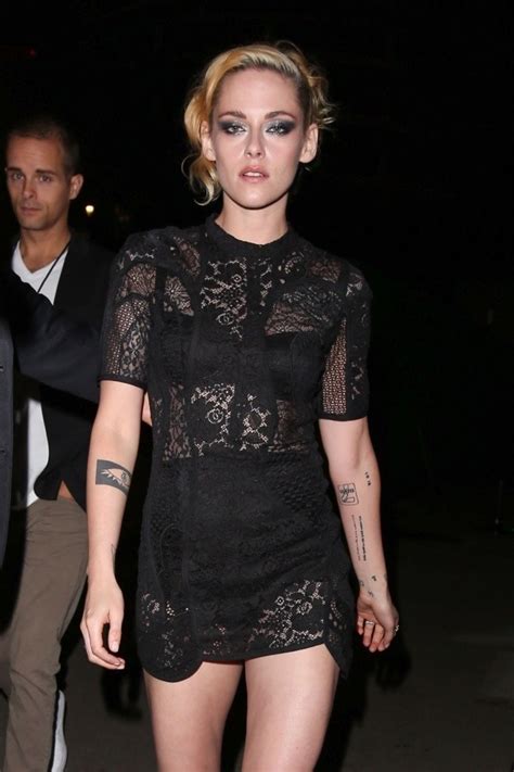 Kristen Stewart Flashes Her Underwear Wearing A Lacy Black Dress