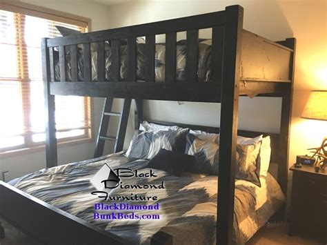 This set usually has a headboard that extends the length of the bed above, which makes the lower bed permanently attached below. Promontory Custom Bunk Bed