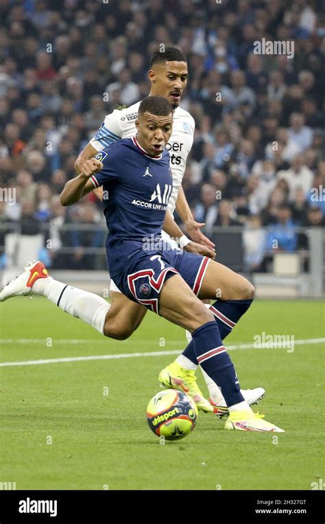 Kylian Mbappe Of Psg William Saliba Of Marseille During The French