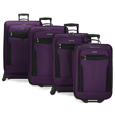 Travelers Choice 4 Piece Spinning And Rolling Purple Luggage Set