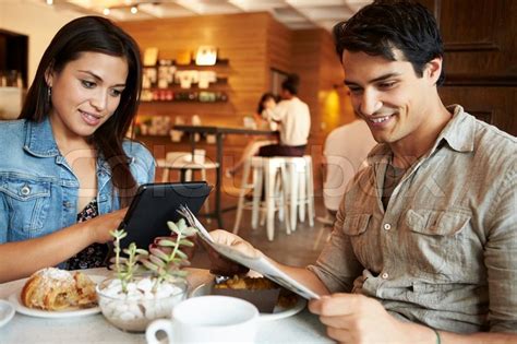 Couple Meeting In Busy Café Restaurant Stock Image Colourbox