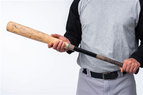Free Photo Close Up Of Baseball Player Holding Bat