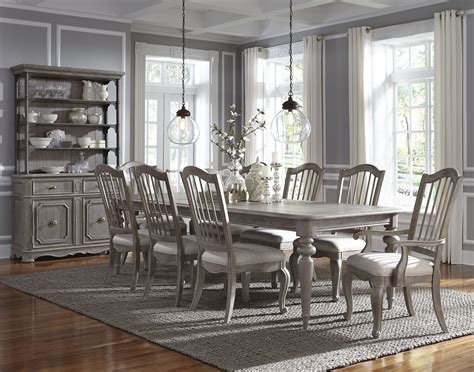 Simply Charming Weathered Grey Extendable Leg Dining Room Set From