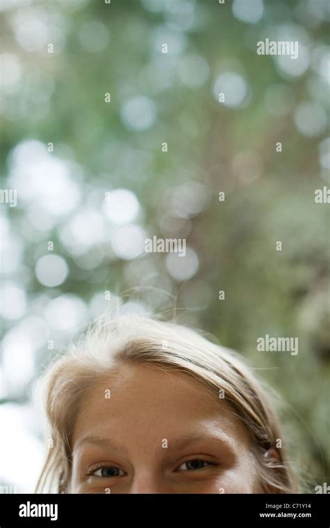 Woman Looking Down At Camera Cropped Stock Photo Alamy