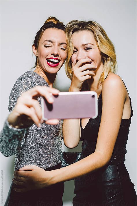 Beautiful Laughing Women Taking A Selfie In A New Year Party