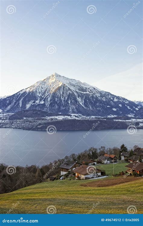 Swiss Lake View Near Thun With A View Of Niesen Mountain In Winter