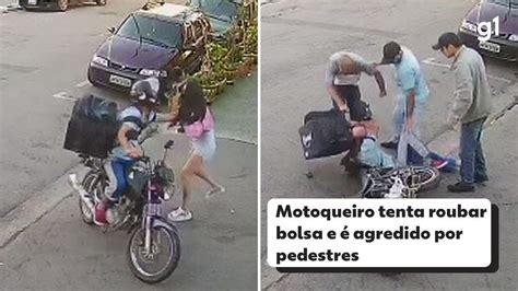 Pedestres Agridem Motociclista E Impedem Roubo De Bolsa De Mulher No