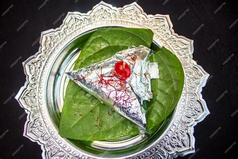 Premium Photo Special Meetha Paan Masala Isolated On Betel Leaf Top View