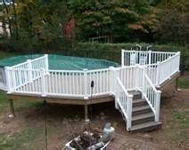 This deck is a 20' x 34' deck designed to go around a 24' round above ground pool. Prefab Above Ground Pool Decks - Bing Images | Above ...