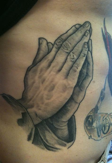 Praying hands tattoo the name itself sounds like it is related to religious. Praying Hands Tattoos Designs, Ideas and Meaning | Tattoos ...
