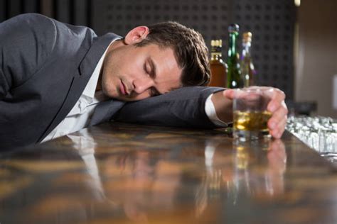 Man Passed Out On Bar In Nightclub Stock Photos Pictures And Royalty