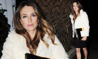 Liz Hurley Carries A Golden T For Her Good Pal Giancarlo Giammettis