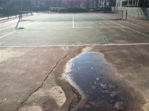 Resurfacing A Tennis Court With The Surface Masters
