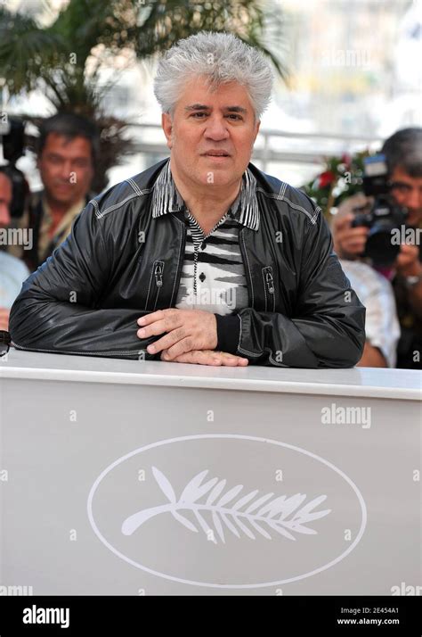 pedro almodovar posing at a photocall for the film broken embraces as part of the 62nd annual
