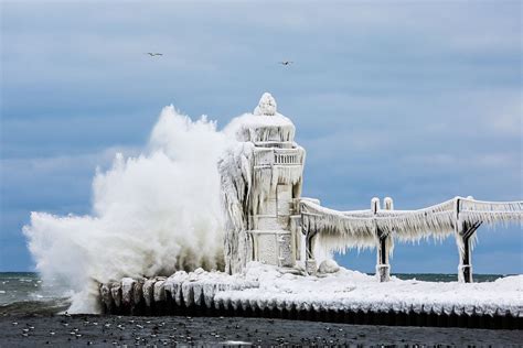 Frozen Lighthouse On Lake Michigan St Joseph Michigan Lake Michigan