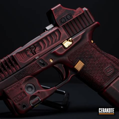 Distressed Glock 43 Cerakoted Using Graphite Black And Ruby Red Cerakote