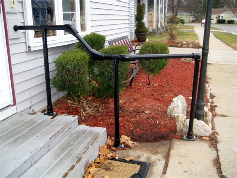 If you have pavers or bricks on the ground under your steps, take these up so you can dig the holes for the upright posts. 5 DIY Metal Stair Railing Examples