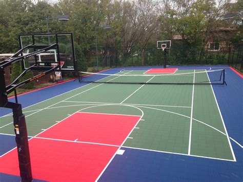 A standard tennis court size is 27' w x 78' l, however versacourt offers a variety two standard kit options and the opportunity custom design your for an added fee, you can also work with one of our certified landscape architects at lanmark designs to integrate your backyard tennis court into a. Backyard Basketball Court Installation in Chicago, IL