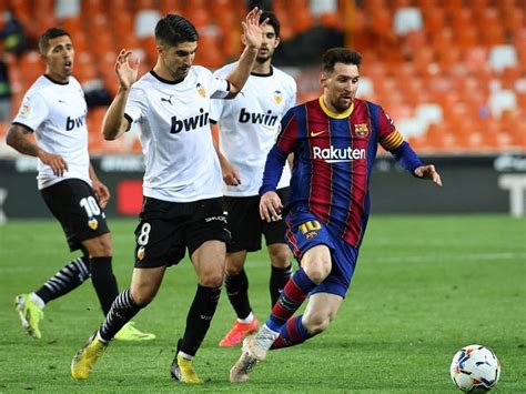 la liga lionel messi double leads barcelona to nail biting win over