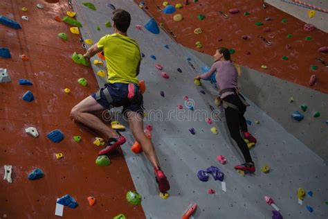 Athletes Rock Climbing In Fitness Studio Stock Image Image Of Active