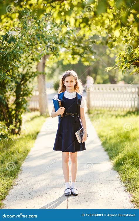 Beautiful Schoolgirl With Backpack And Books Outdoors Stock Image Image Of Education Cheerful