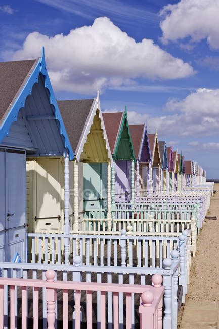 Row Of Colorful Beach Huts In England Great Britain Europe — Railing