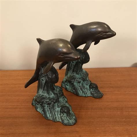 A Pair Of Bronze Dolphins Bronzes Hemswell Antique Centres