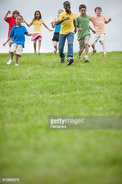 Boy Running Down Hill Photos And Premium High Res Pictures Getty Images