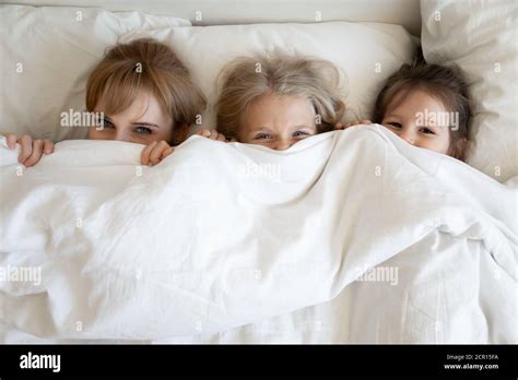 Woman Peeking Out Under Cover Hi Res Stock Photography And Images Alamy