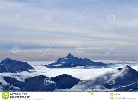 Beautiful View Of Clouds Crossing The Mountain Ridge Awesome Mountain