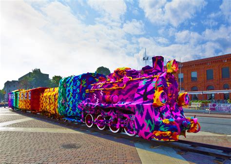 Add textures, tones and details to your outfit this season with a knitted top. Yarn Bombed Train by Olek - Opencity Projects