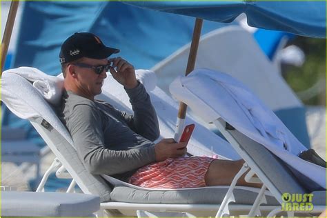 peyton manning flaunts ripped abs while shirtless at the beach photos photo 4493009 ashley