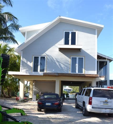 We've painted thousands of living rooms, kitchens, bedrooms, bathrooms, and when choosing an exterior paint there are many factors to consider. Florida Keys exterior paint color help needed!
