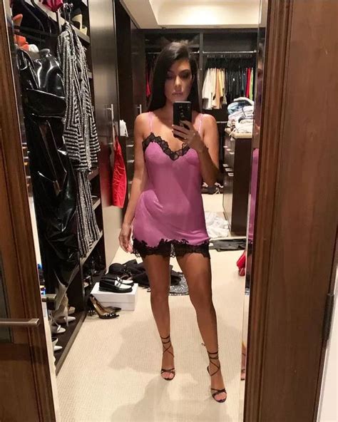 kourtney kardashian flaunts cleavage in sheer pink lingerie and high heels daily star