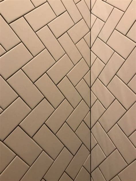 The Corner Matched Tiles In This Herringbone Bathroom Wall