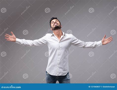 Man Showing Relieved Gesture With Spread Arms Stock Image Image Of
