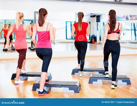 Group Of Smiling People Doing Aerobics Stock Image Image Of Body