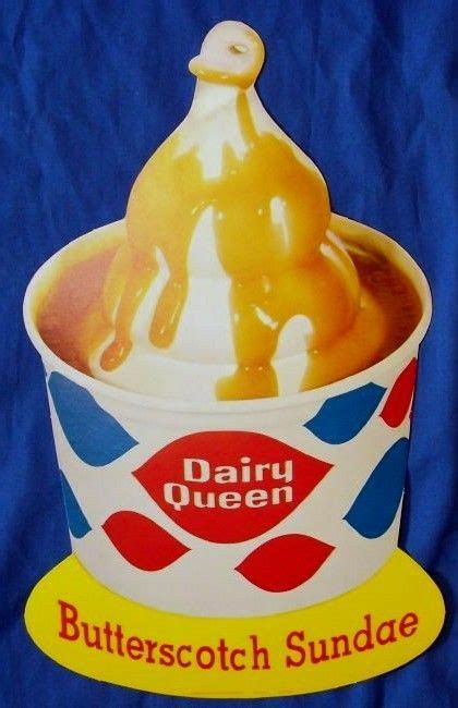 Dairy Queen Butterscotch Sundae Is In A Plastic Cup On A Blue Background