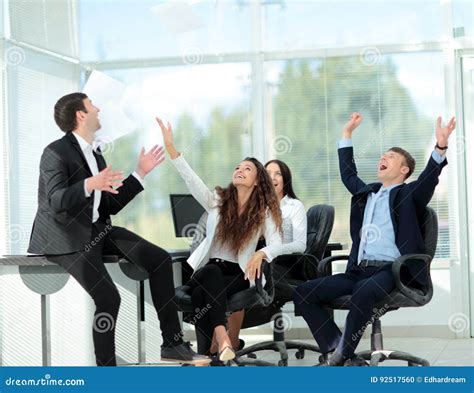 Successful And Confident Business Team Celebrating Win Stock Photo